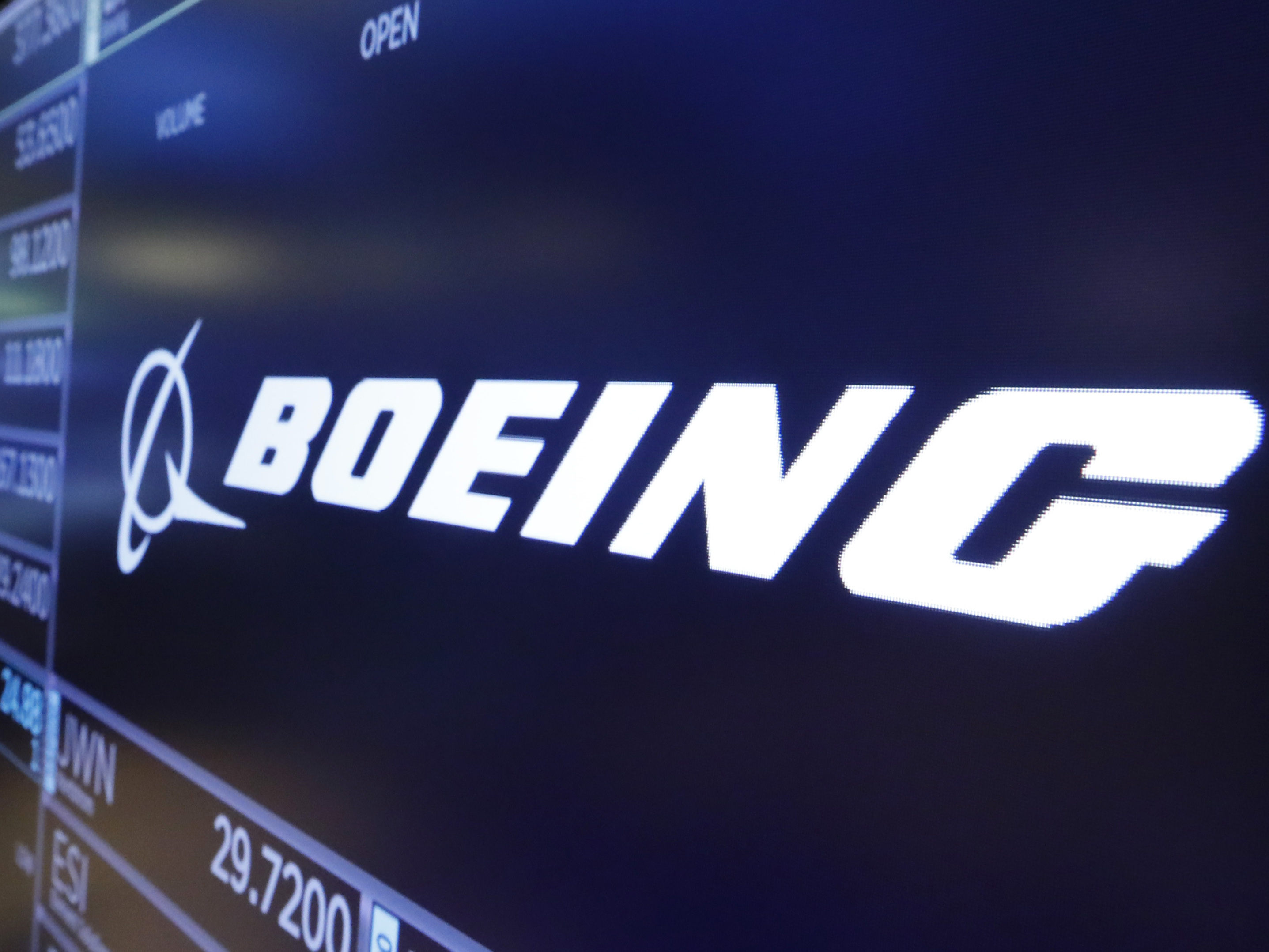 caption: Boeing will delay release of its 777X long-haul jet, complicating Qantas Airways' plans to introduce the world's longest commercial flight — from Sydney to London — in 2023.