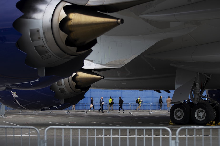 caption: Media and guests arrive at the Boeing Everett factory for the celebration of the last 747, pictured here, on Tuesday, Jan. 31, 2023, in Everett. 