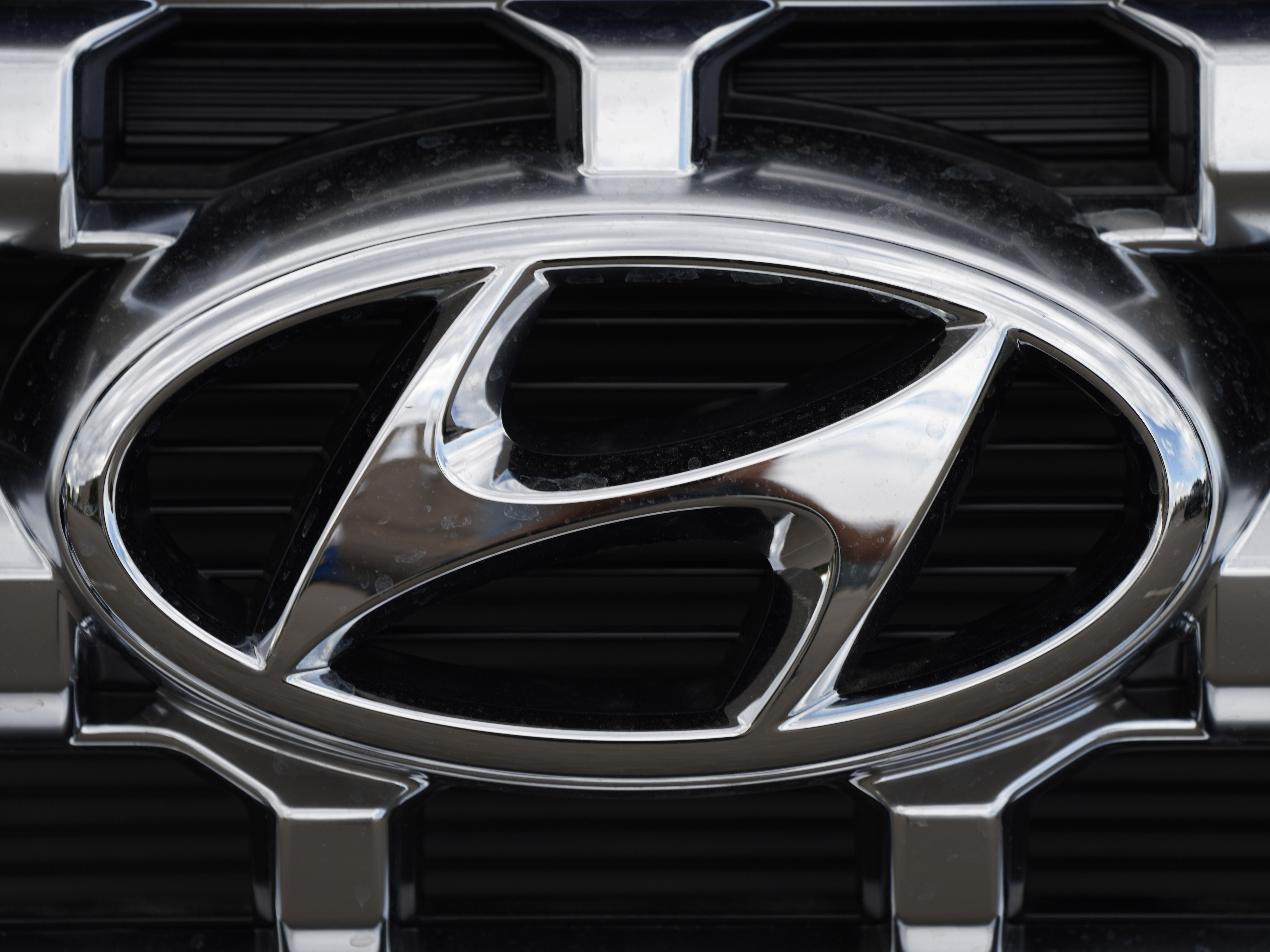 caption: Hyundai and Kia are telling owners of over 571,000 SUVs and minivans in the U.S. to park them outdoors because the tow hitch harnesses can catch fire while they are parked or being driven. The Korean automakers are recalling the vehicles.