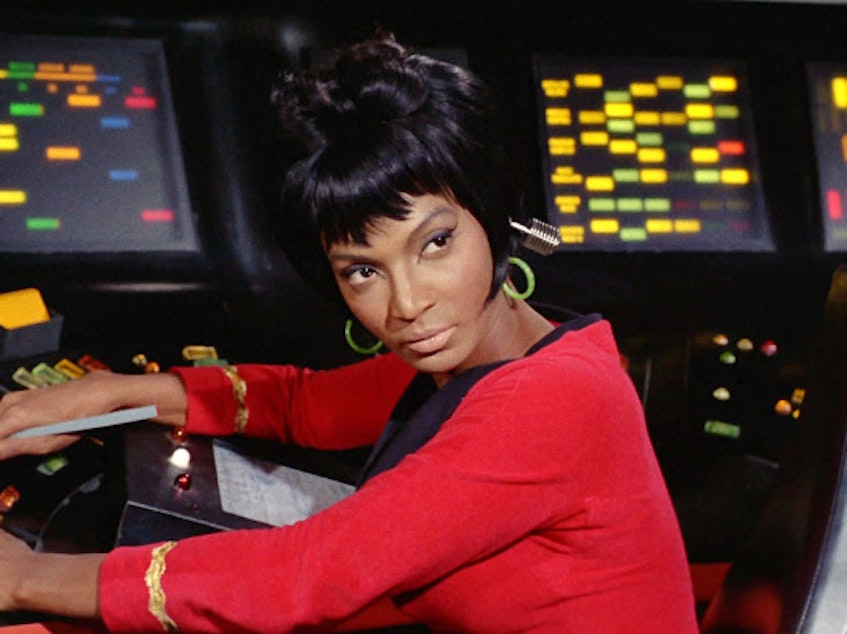 caption: Nichelle Nichols made history for her role as communications officer Lt. Uhura on <em>Star Trek. </em>