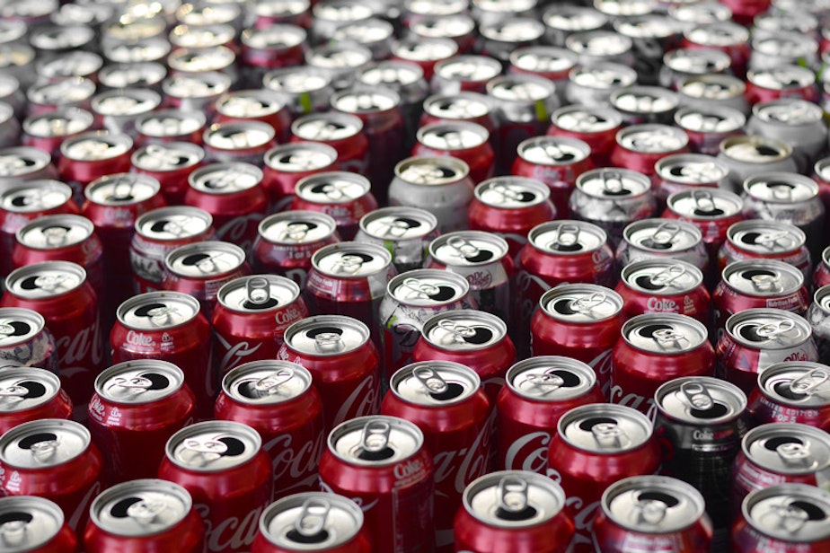 caption: File photo of Coca-Cola cans
