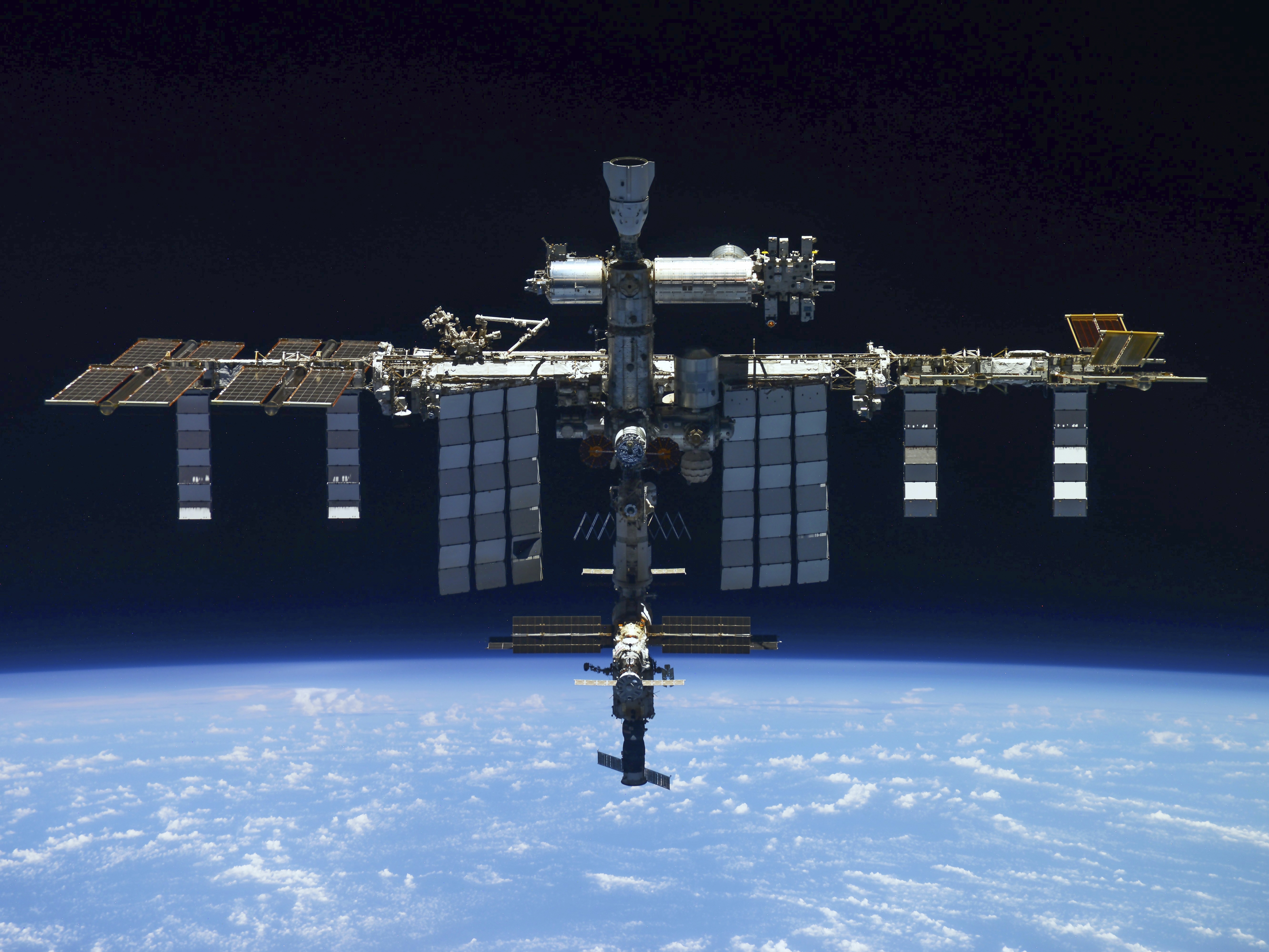 caption: The International Space Station serves as an orbiting scientific laboratory where astronauts conduct experiments. The Trump administration has proposed cutting its budget by roughly $500 million and reducing research at the outpost.