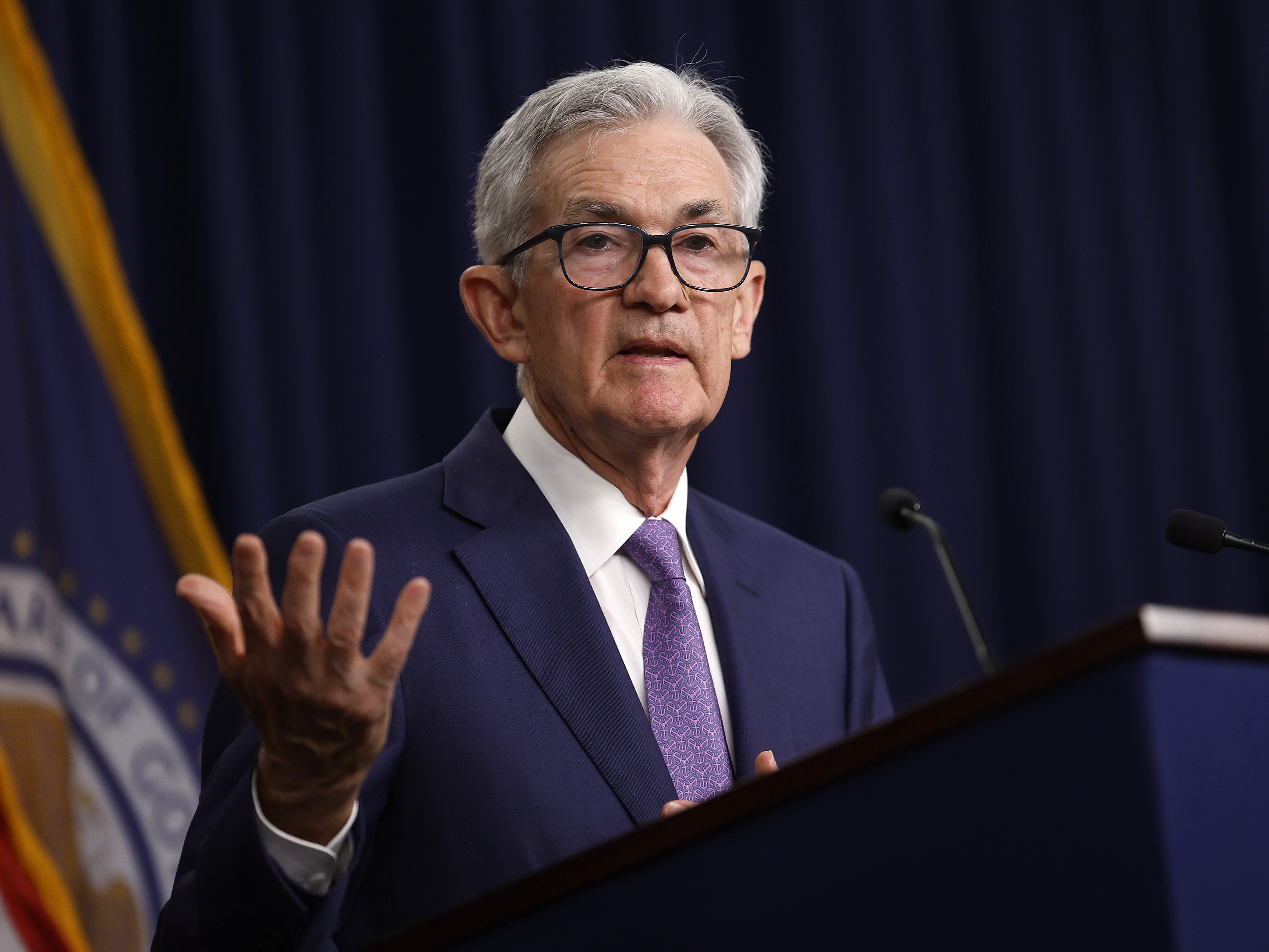caption: The Federal Reserve held interest rates steady Wednesday but signaled that rate cuts could come soon if inflation continues to moderate.