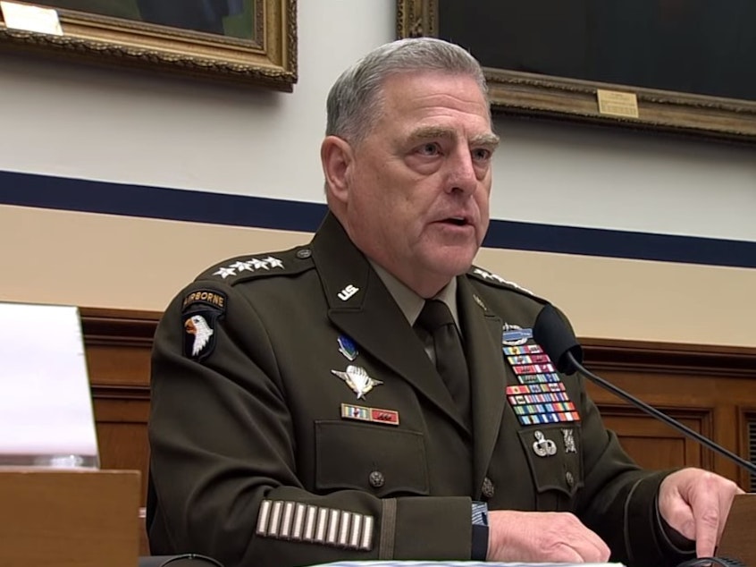 caption: Joint Chiefs Chairman Mark Milley pushes back against questions from Florida Rep. Matt Gaetz at Wednesday's hearing.
