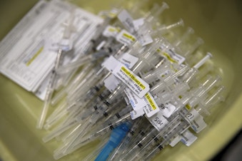 caption: Doses of the Pfizer-BioNTech Covid-19 vaccine are shown ready to be used on Thursday, April 15, 2021, at Lumen Field Event Center in Seattle. As of Thursday, anyone 16 years of age and older is eligible.