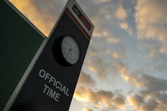 caption: "One second doesn't sound like much, but in today's interconnected world, getting the time wrong could lead to huge problems," geophysicist Duncan Agnew says. Here, an official clock is seen at a golf tournament in Cape Town, South Africa.