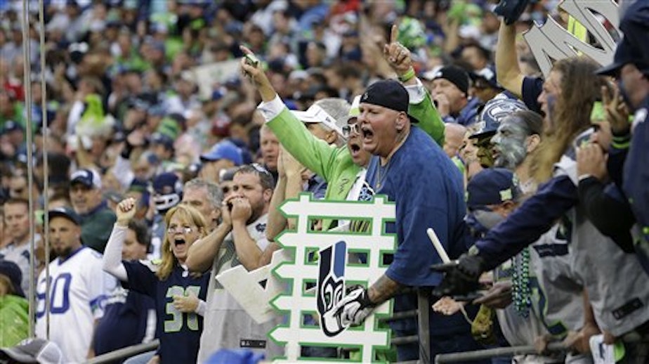 caption: Fans at a Seattle Seahawks match.