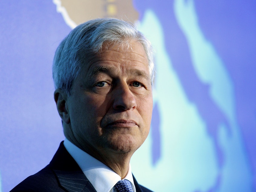 caption: JPMorgan Chase CEO Jamie Dimon says the coronavirus pandemic will have devastating consequences for the global economy.