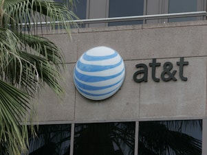 caption: Federal prosecutors say they have uncovered a scheme in which AT&T employees were bribed to illegally unlock millions of phones.