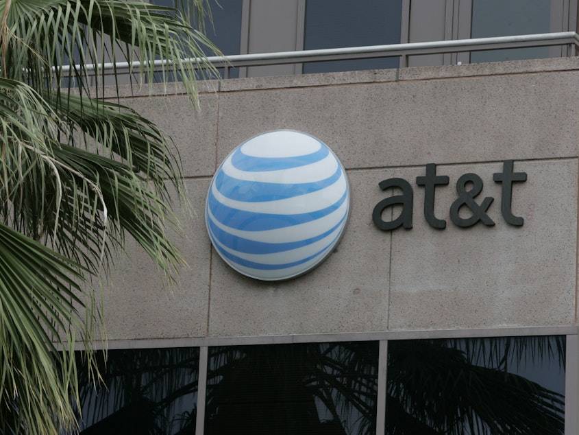 caption: Federal prosecutors say they have uncovered a scheme in which AT&T employees were bribed to illegally unlock millions of phones.