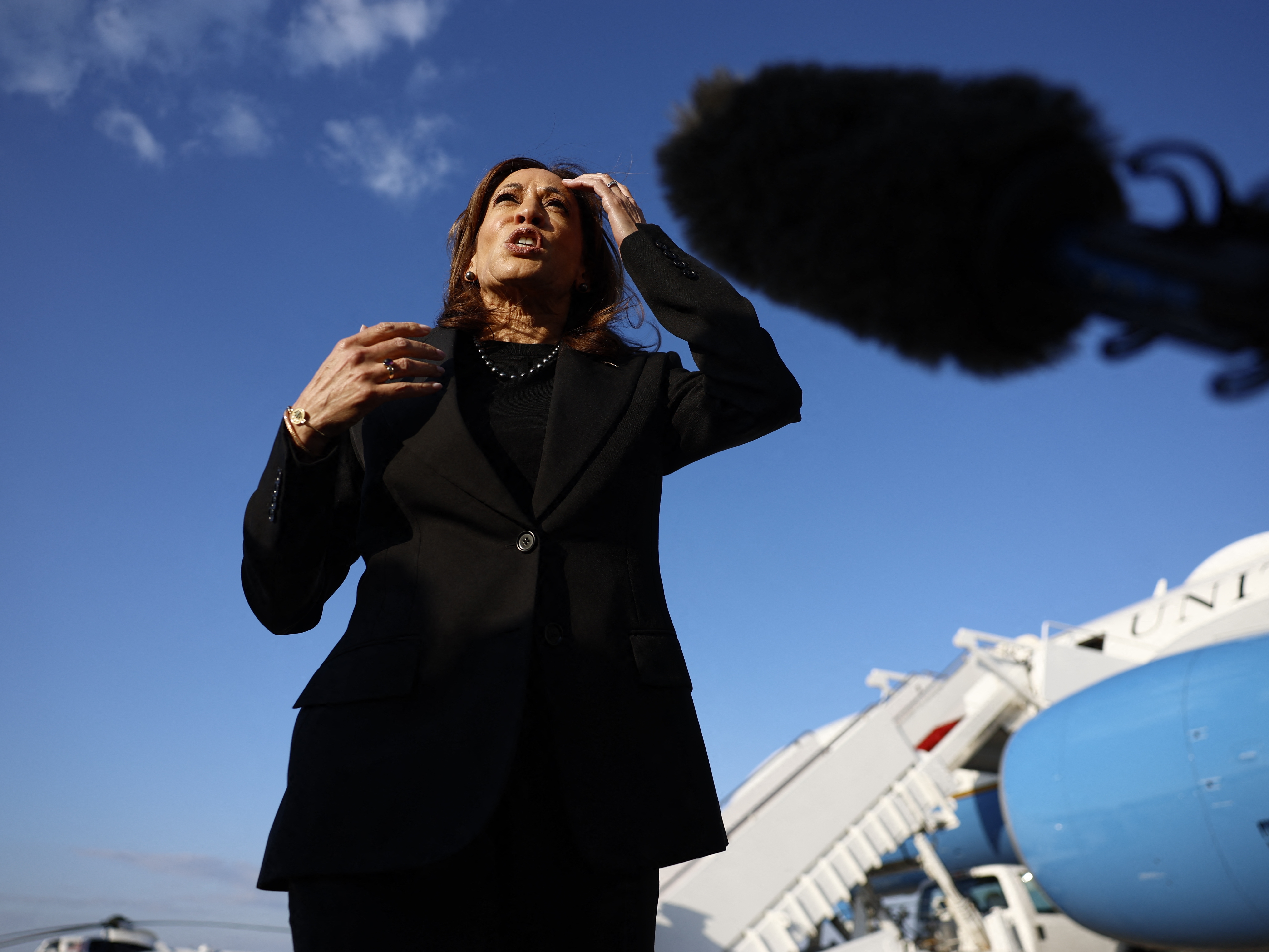 caption: Vice President Harris speaks to media members before departing for New York at Joint Base Andrews in Maryland on Monday. Harris appeared on the CBS news magazine <em>60 Minutes </em>on Monday, where she answered questions about her economic plans, the war in Ukraine and the U.S.-Mexico border.
