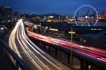 caption: Traffic is shown on the Alaskan Way Viaduct on Wednesday, January 2, 2019, from Victor Steinbrueck Park near Pike Place Market in Seattle. 