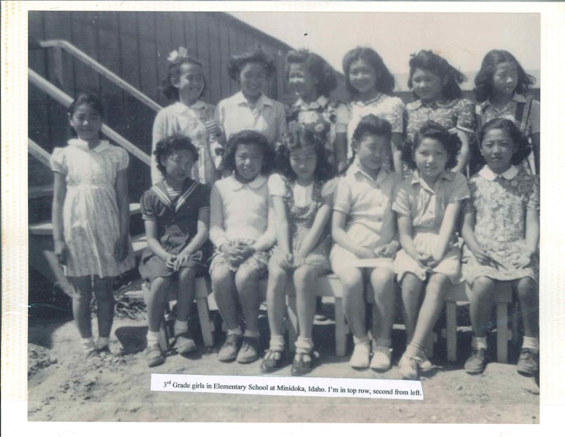 caption: Rose, Bruce Harrell's mother, (top row second from left) poses for a 3rd grade class photo at Minidoka Prison Camp in Idaho during World War II.

