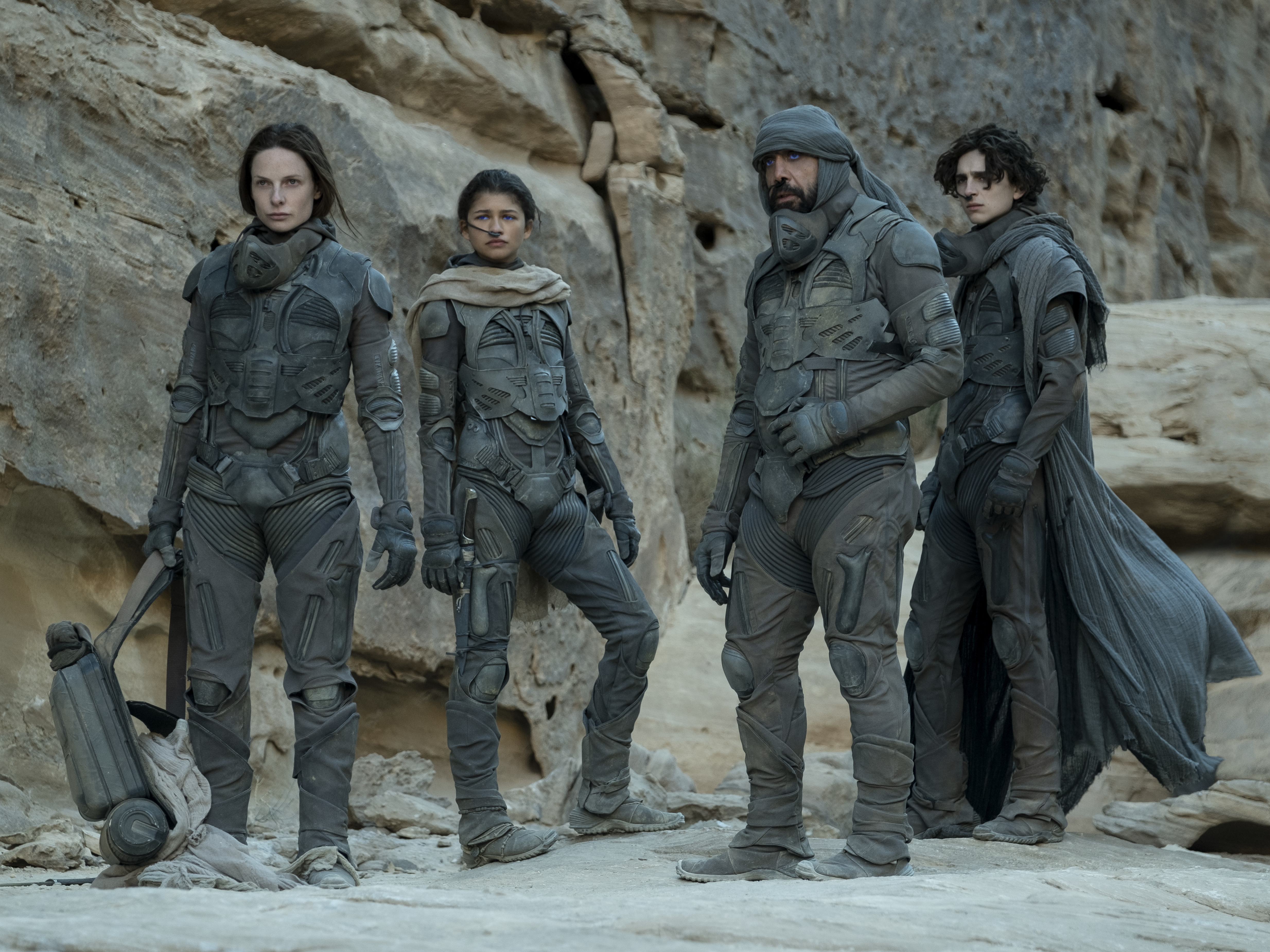caption: Rebecca Ferguson as Lady Jessica Atreides, Zendaya as Chani, Javier Bardem as Stilgar, and Timothée Chalamet as Paul Atreides