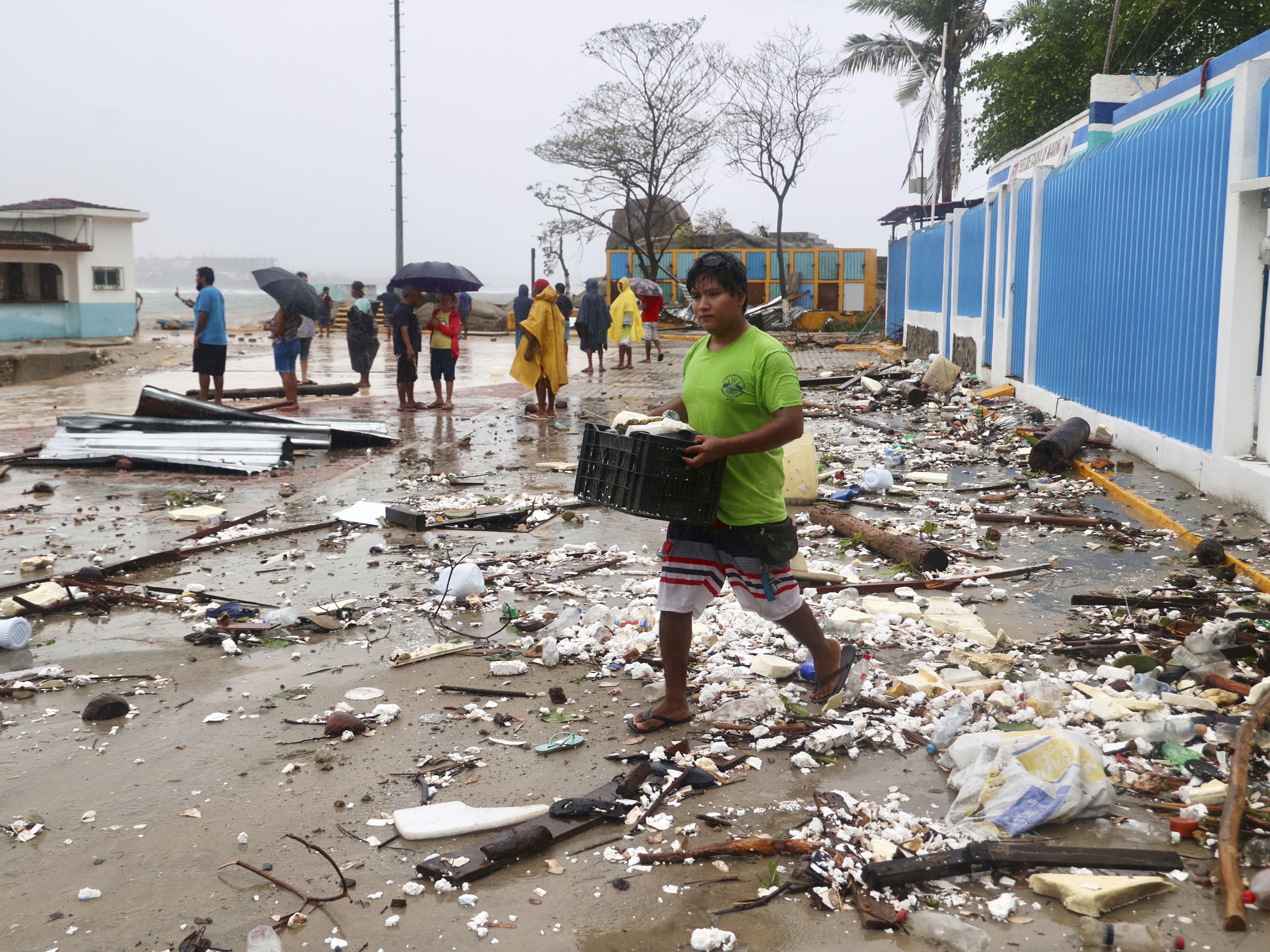 caption: Hurricane Erick hit Oaxaca, Mexico, in June. Hurricane forecasters used data collected by Department of Defense satellites to monitor the storm as it intensified more rapidly than computer models had suggested it would. Such DoD data will no longer be shared with forecasters.