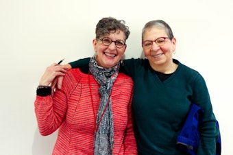caption: KUOW's Marcie Sillman with book hugger Nancy Pearl.