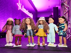 caption: The American Girl dolls have evolved over the years.