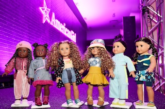 caption: The American Girl dolls have evolved over the years.