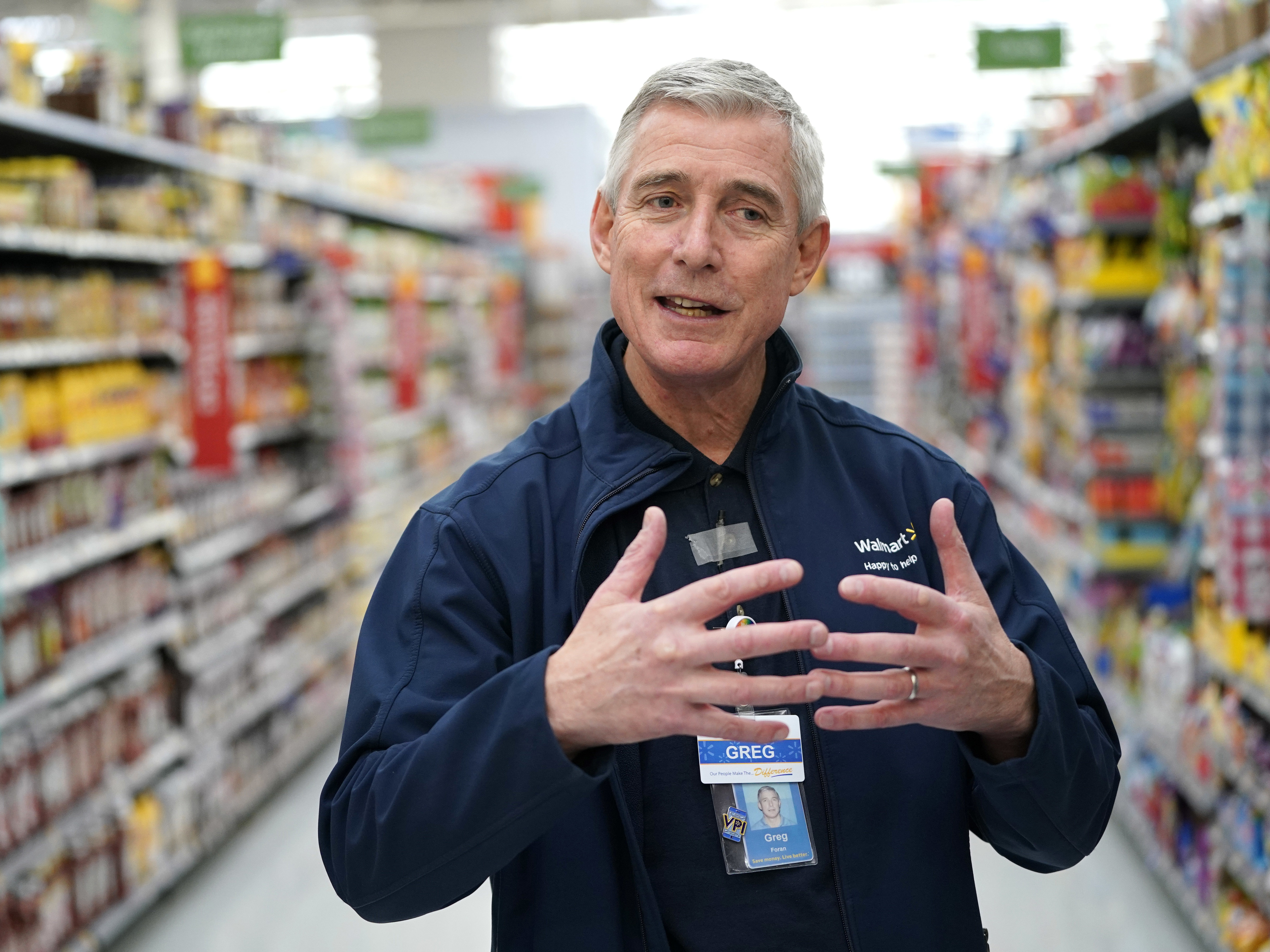 caption: In a memo to store managers, Walmart U.S. CEO Greg Foran said the company is looking for other roles for greeters with disabilities who are due to lose their jobs.