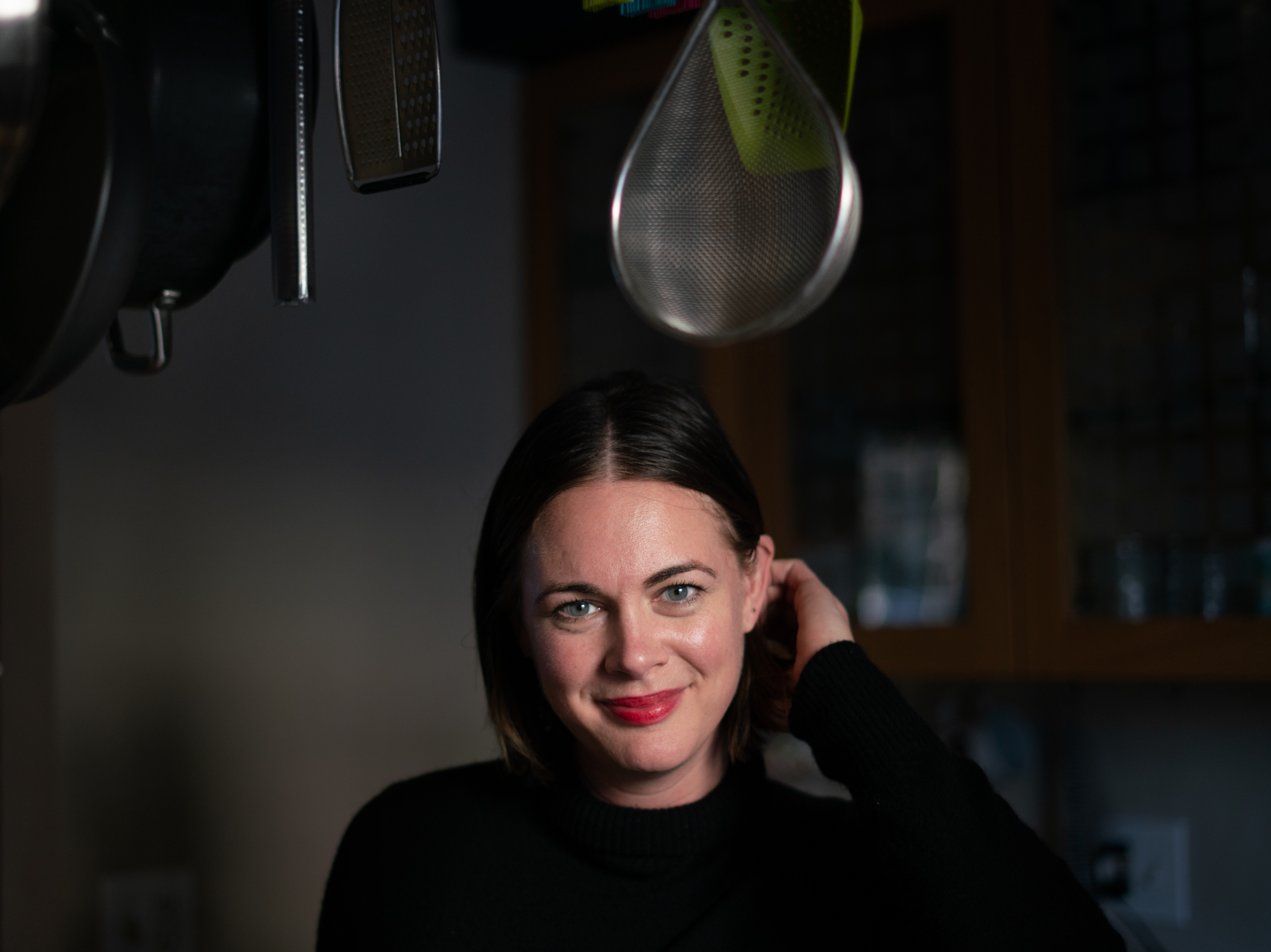 caption: Alison Roman stresses that preparing dinner for others doesn't have to be a piece of performance art.
