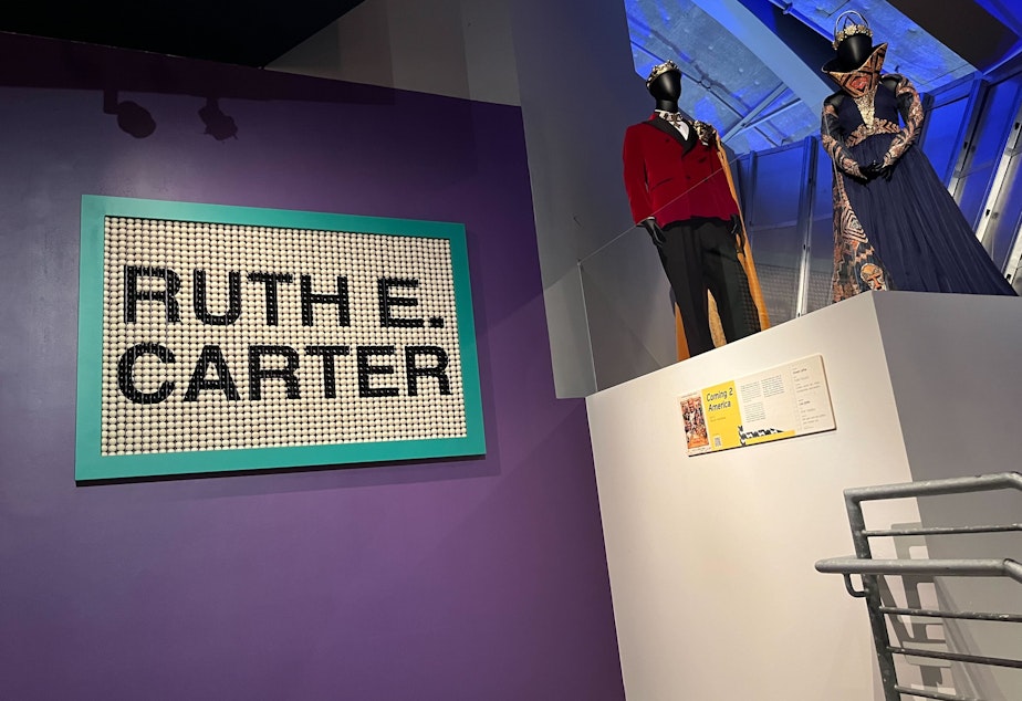 caption: Ruth Carter's costume and design exhibit at MoPop is a journey through her full catalog of work, from the recent film "Coming 2 America" to Denzel Washington's "Malcolm X."