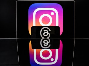 caption: Meta is rolling out new changes to Instagram and Threads, automatically limiting the amount of political content users see from accounts they do not follow.