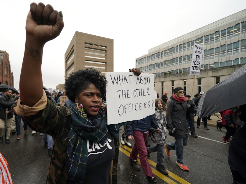 caption: Protesters march Saturday, Jan. 28, 2023, in Memphis, Tenn., over the death of Tyre Nichols, who died after being beaten by Memphis police.