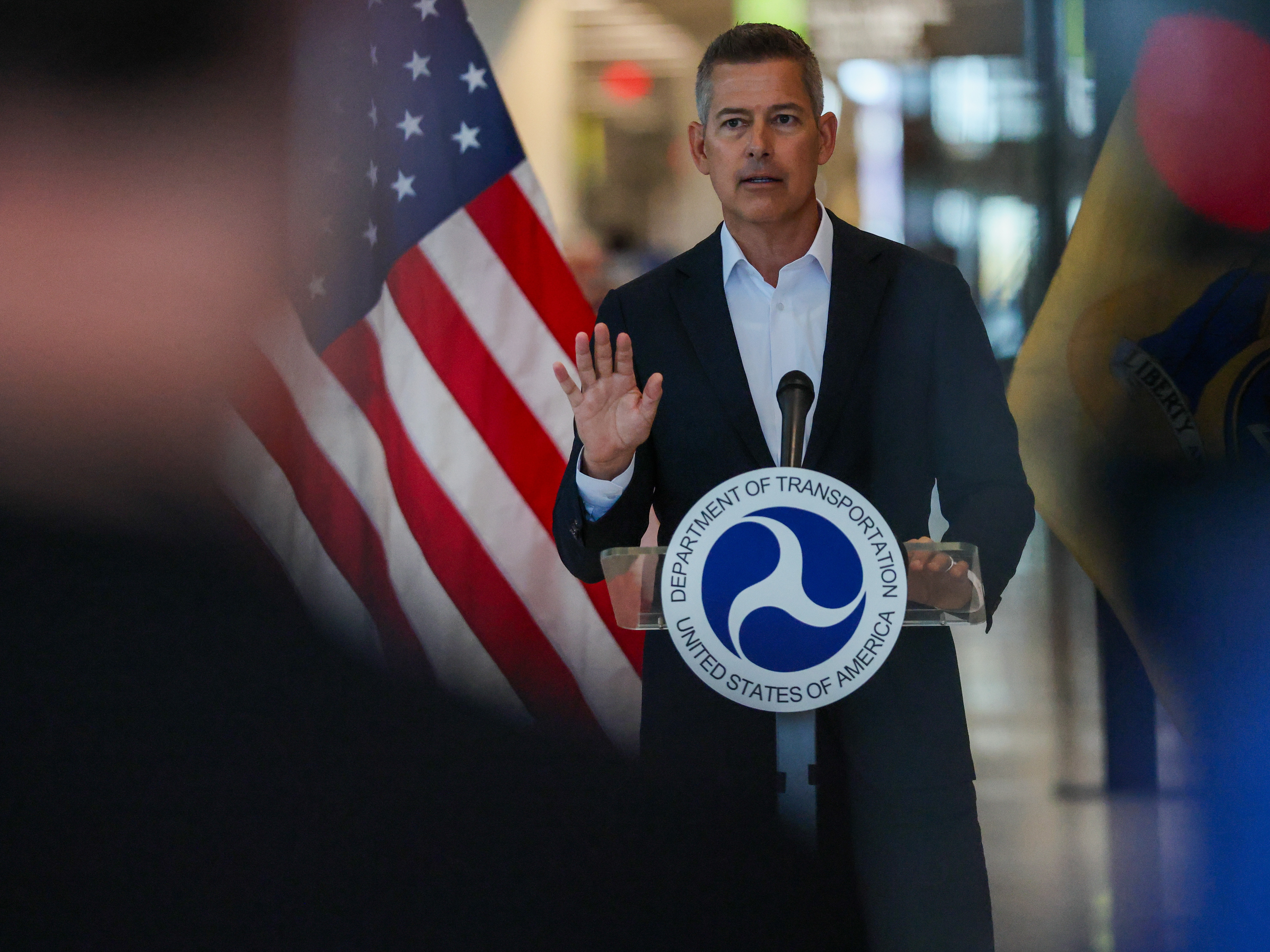 caption: Transportation Secretary Sean Duffy had tied the disbursement of transportation grant funds for roads, highways, bridges and development of other transportation projects to a state's cooperation with ICE. But on Thursday, federal Judge John McConnell issued a preliminary injunction against the policy.