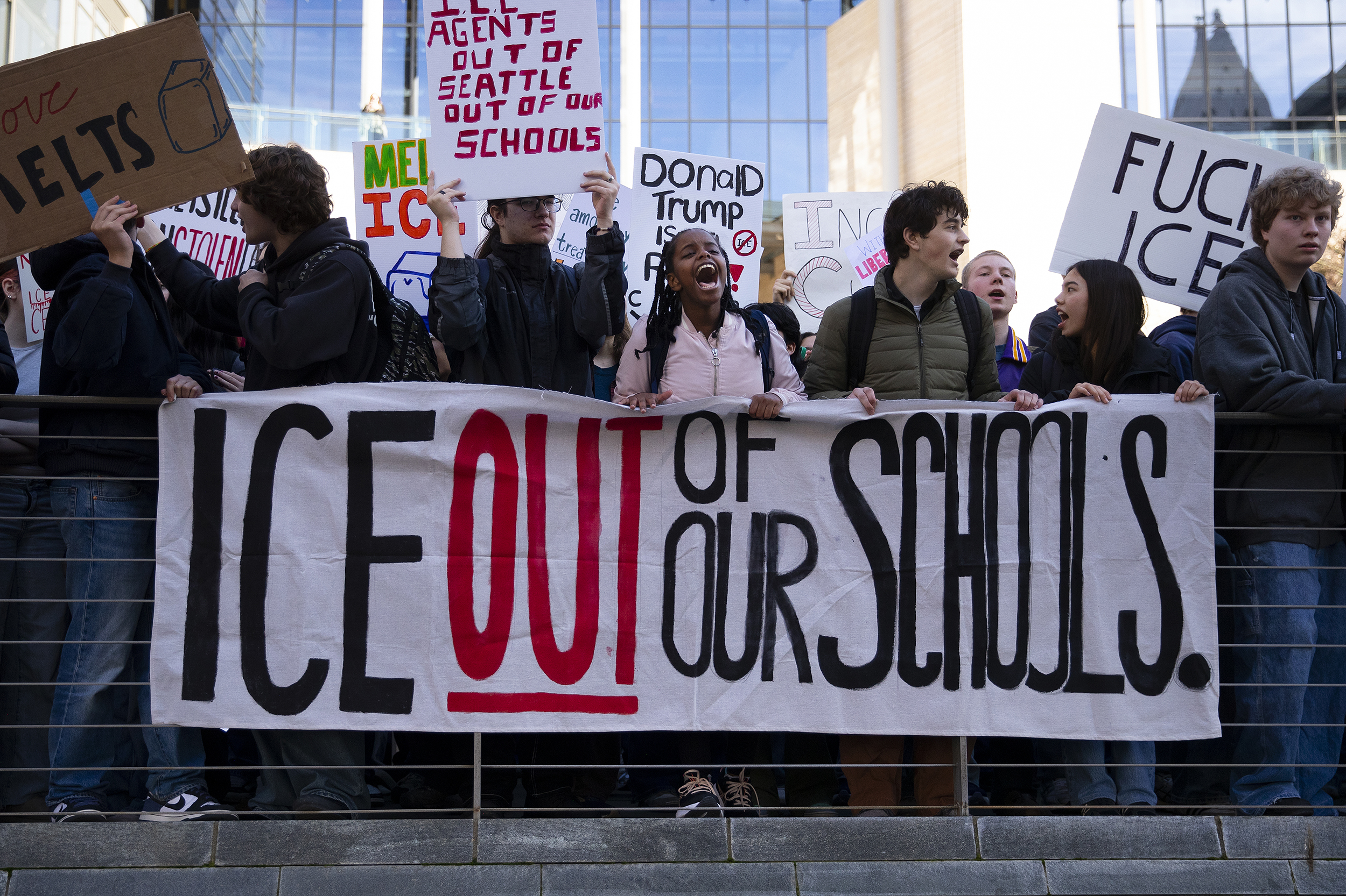 caption: Garfield High School student Josie Dion, center, leads a chant as hundreds of Seattle students from various schools gathered for an "ICE Out of Seattle Schools" rally on Thursday, Feb. 5, 2026, at Seattle City Hall. 