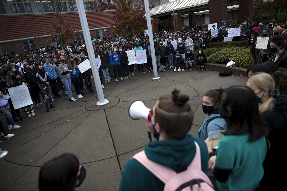 caption: Interlake High School students protest the school administration's handling of cases of sexual assault on Tuesday, November 23, 2021, at Interlake High School in Bellevue.