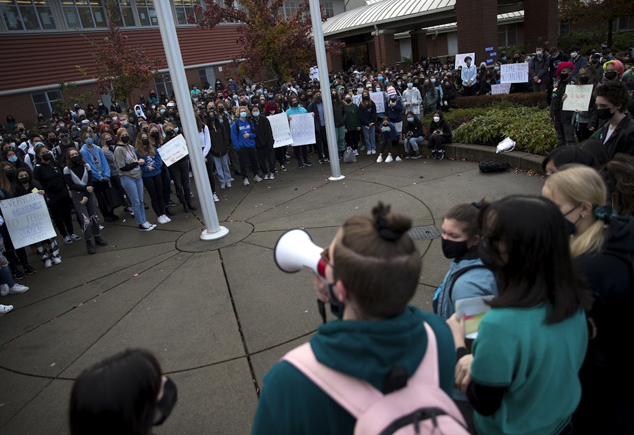 caption: Interlake High School students protest the school administration's handling of cases of sexual assault on Tuesday, November 23, 2021, at Interlake High School in Bellevue.