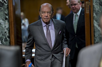 caption: Commerce Secretary Wilbur Ross arrives at a U.S. Senate hearing in June. He added a citizenship question to the 2020 census that has sparked six lawsuits from dozens of states, cities and other groups that want it removed.
