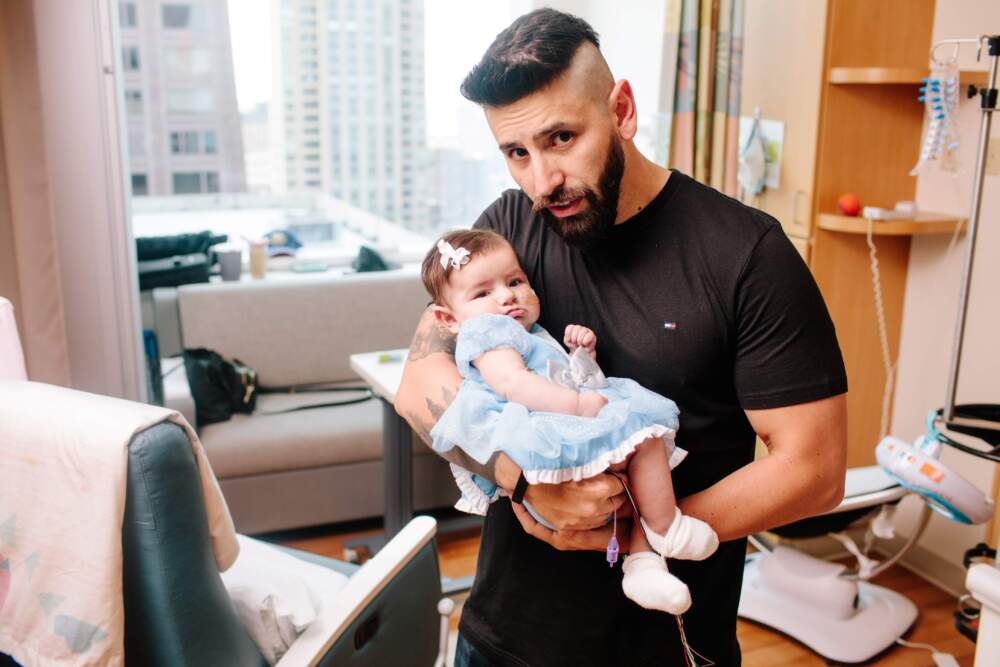 caption: A program in a handful of states is monitoring the physical and mental health of new dads. (Courtesy of Ann & Robert H. Lurie Children’s Hospital of Chicago via the FCHIP Fathers Photobook)