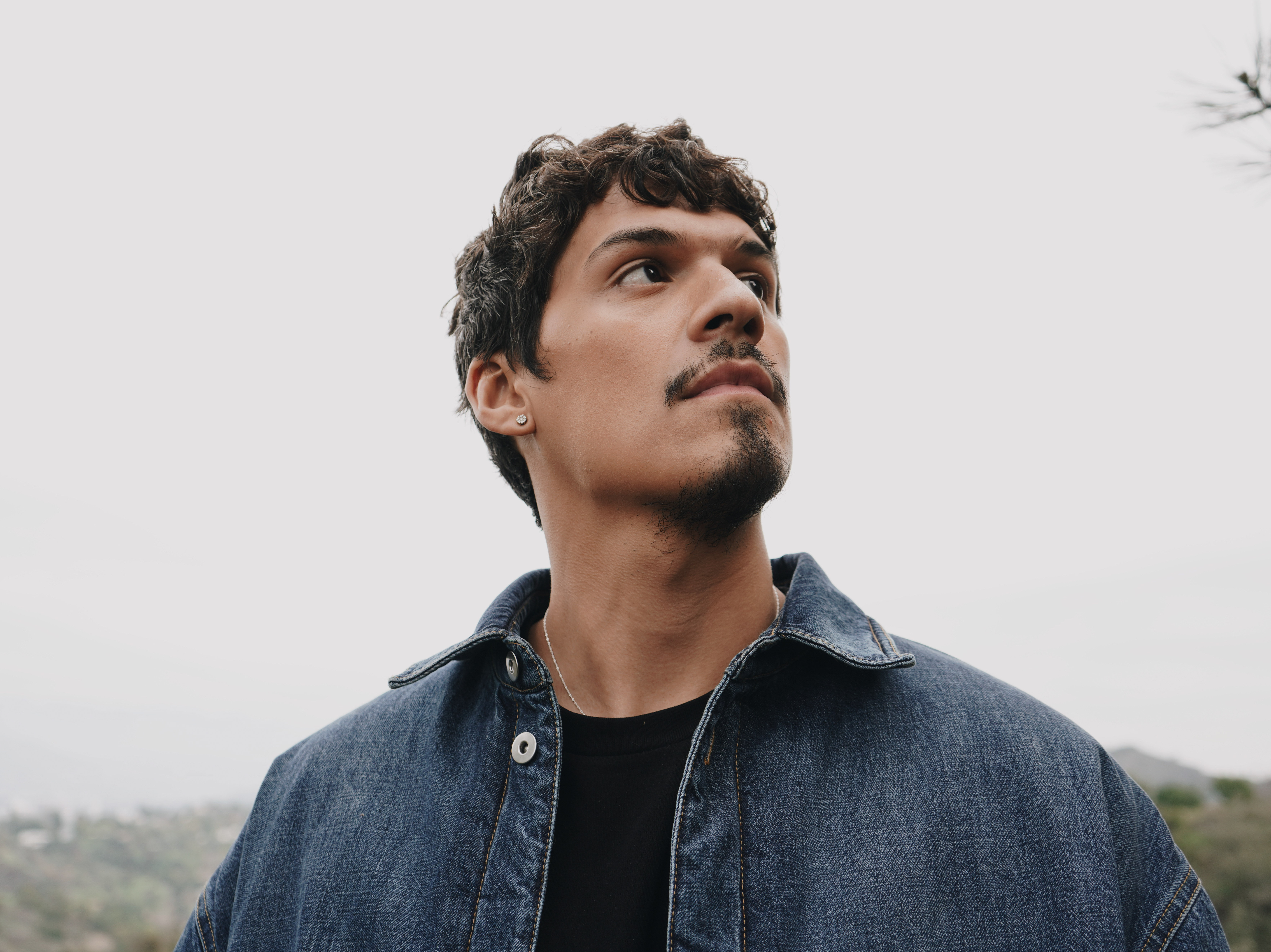 caption: Omar Apollo poses for a portrait in Beverly Hills, Calif. on Jan. 8, 2023.