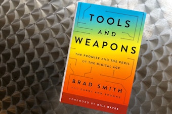caption: "Tools and Weapons: The Promise and the Peril of the Digital Age" by Brad Smith and Carol Ann Browne.
