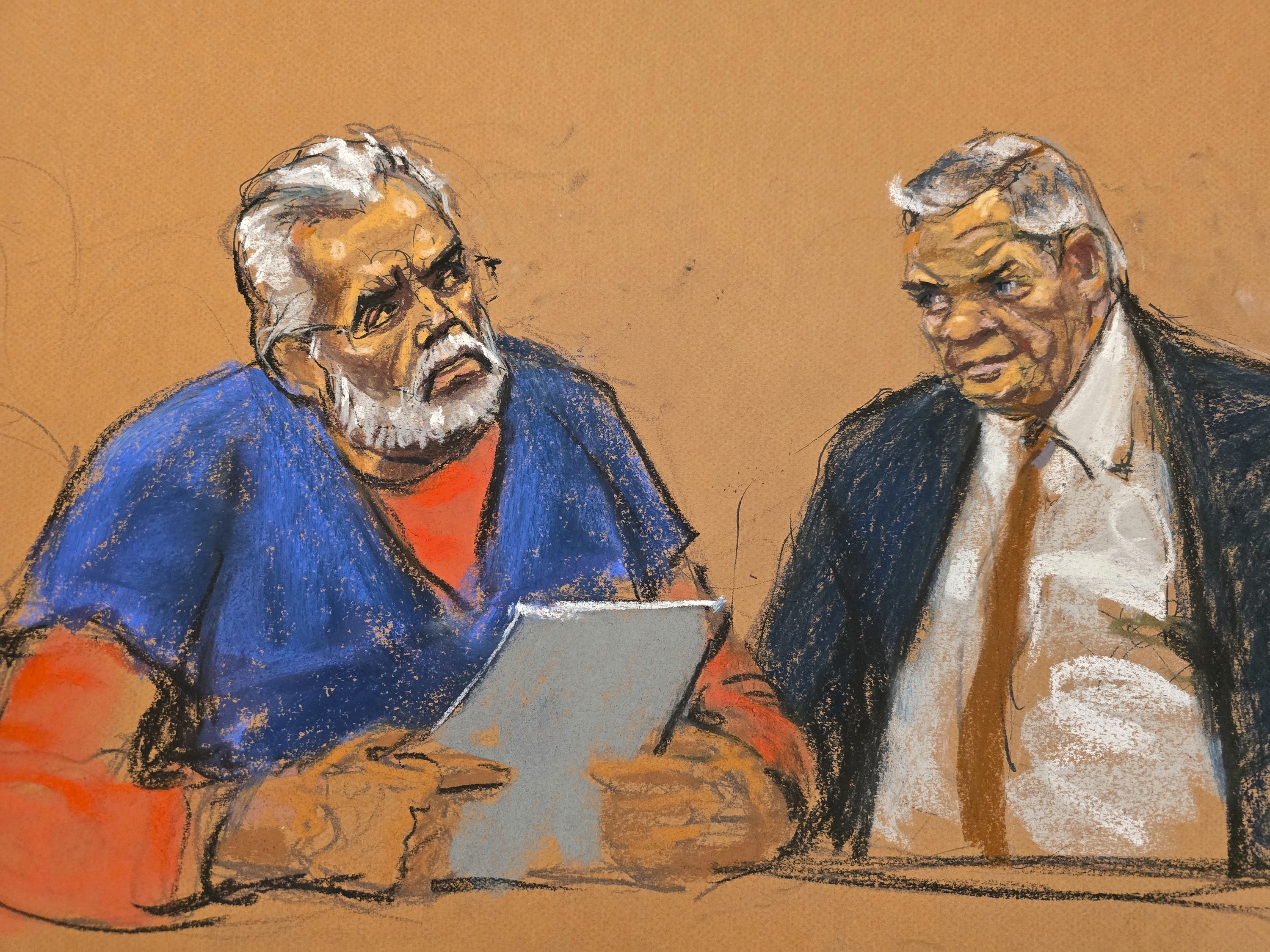 caption: "El Mayo" Zambada speaks to Judge Brian Cogan (not pictured) in Brooklyn federal court, as his defense attorney Frank Perez looks on, Monday, Aug. 25, 2025, in New York.