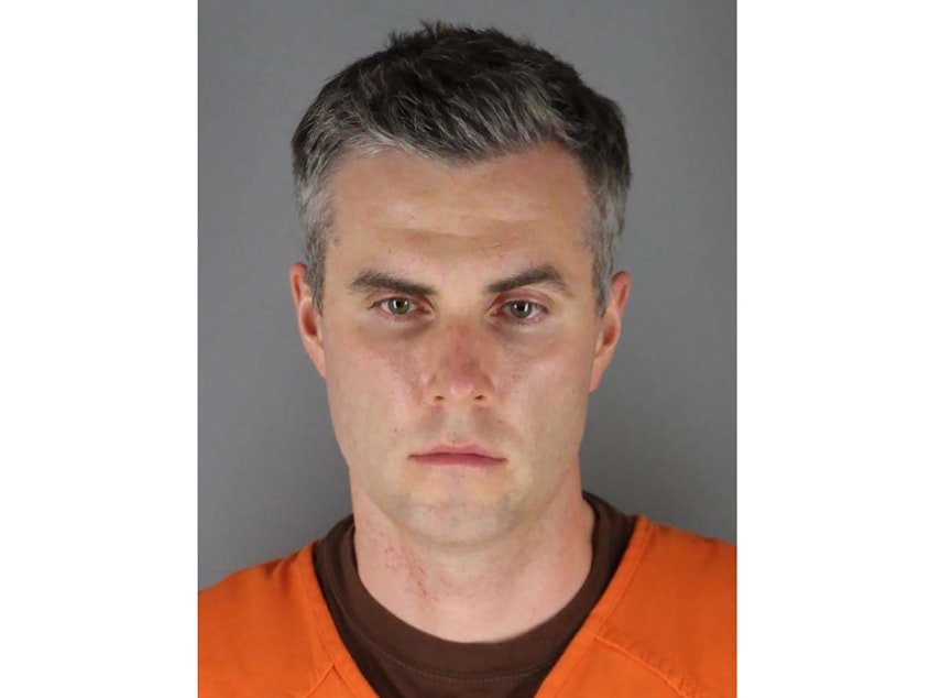 caption: Former Minneapolis police officer Thomas Lane is already serving a 2 1/2-year federal sentence for violating George Floyd's civil rights.