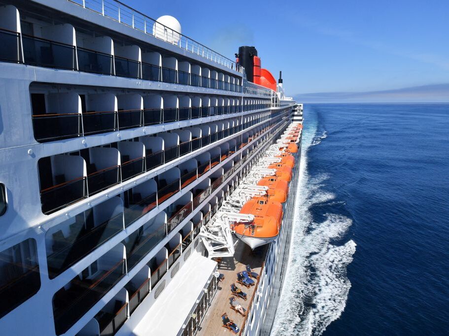 caption: The Cunard cruise liner RMS Queen Mary 2 was among several ships to see an outbreak of vomiting and diarrhea caused by norovirus this winter.