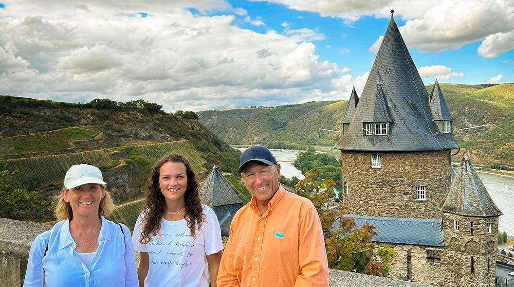 caption: Kim Hurst (L to R), Selina Rüecker and Rich Hurst pose for a picture during the Hursts' trip to Germany in July 2023 to meet Rüecker, Rich Hurst's bone marrow donor.