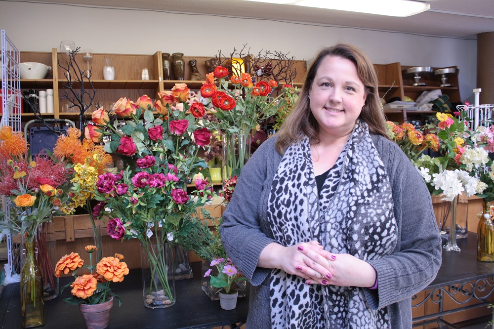 caption: Rachel Martin owns and manages Ballard Blossom. She says she monitors the news, apps and public websites to determine the most efficient route for her delivery drivers.