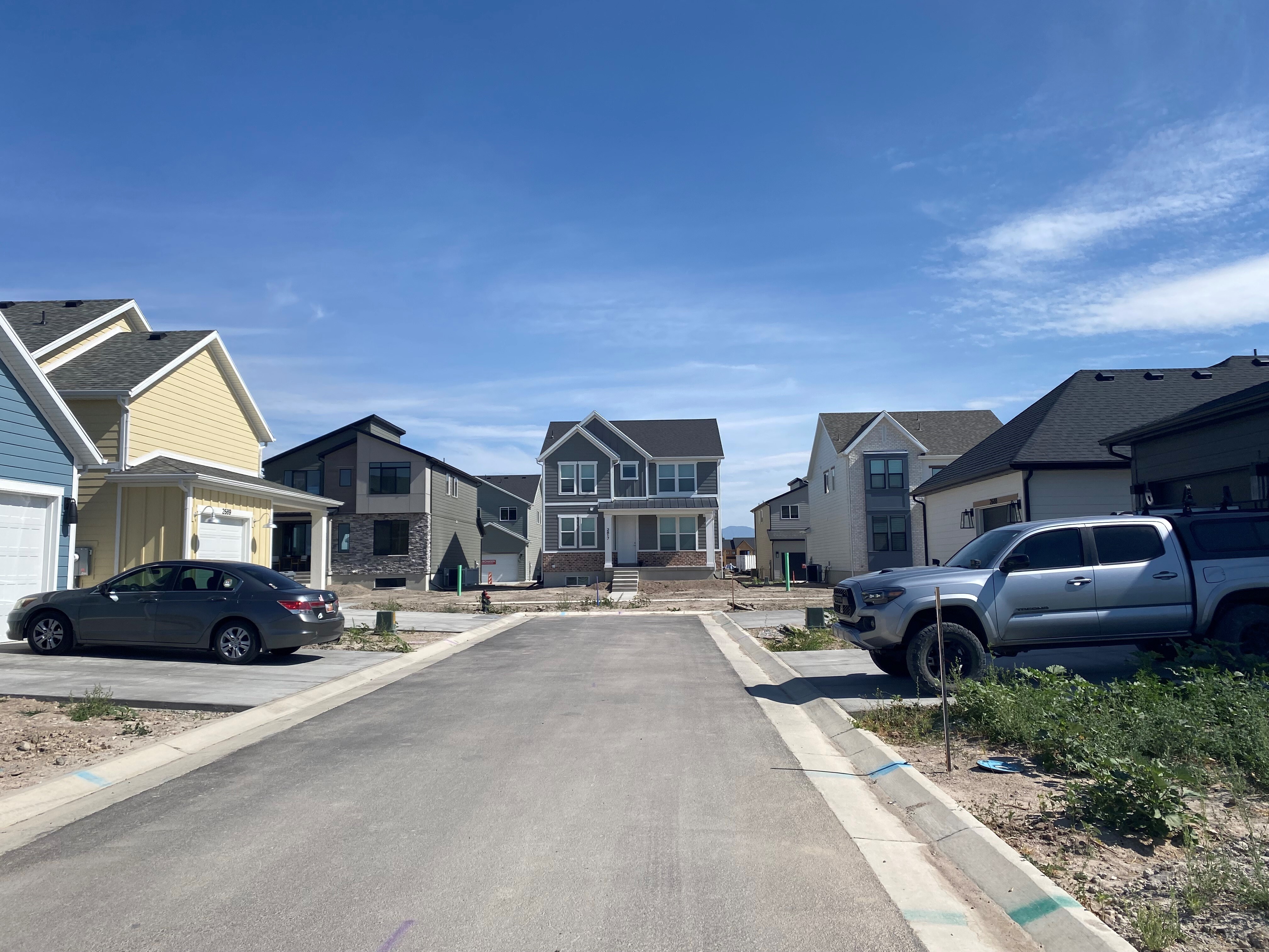 caption: A new Nilson Homes development in Plain City, Utah, includes smaller starter homes side by side with larger market-rate ones.