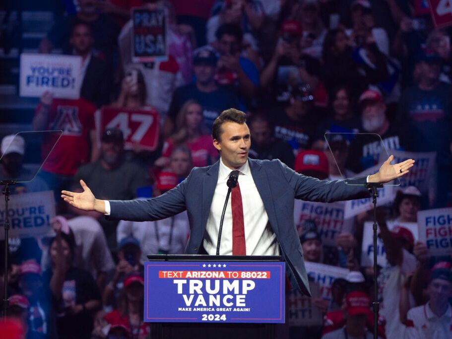 caption: Turning Point USA Founder Charlie Kirk speaks during a campaign rally for now-President Trump in Glendale, Ariz., in August 2024.