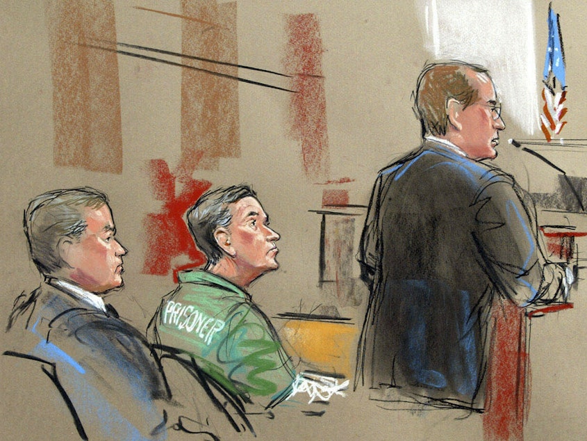 caption: In this artist depiction, U.S. Attorney Randy Bellows, right, addresses the court during the sentencing of convicted spy Robert Hanssen, center, seen with his attorney Plato Cacheris, left, at the federal courthouse in Alexandria, Va., May 10, 2002.