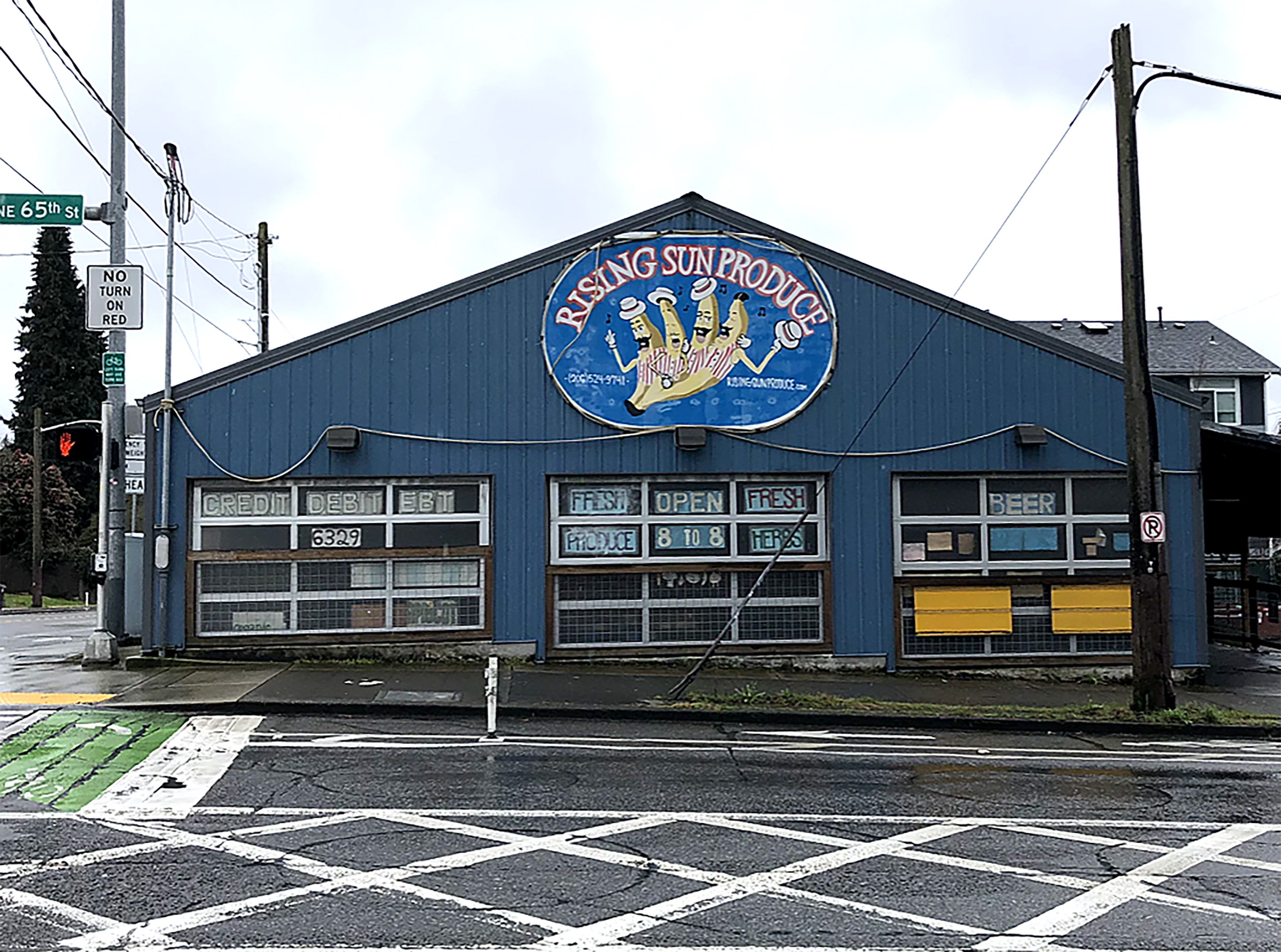 caption: Rising Sun Produce in Seattle's Roosevelt neighborhood is shuttered after a morning fire damaged the store.