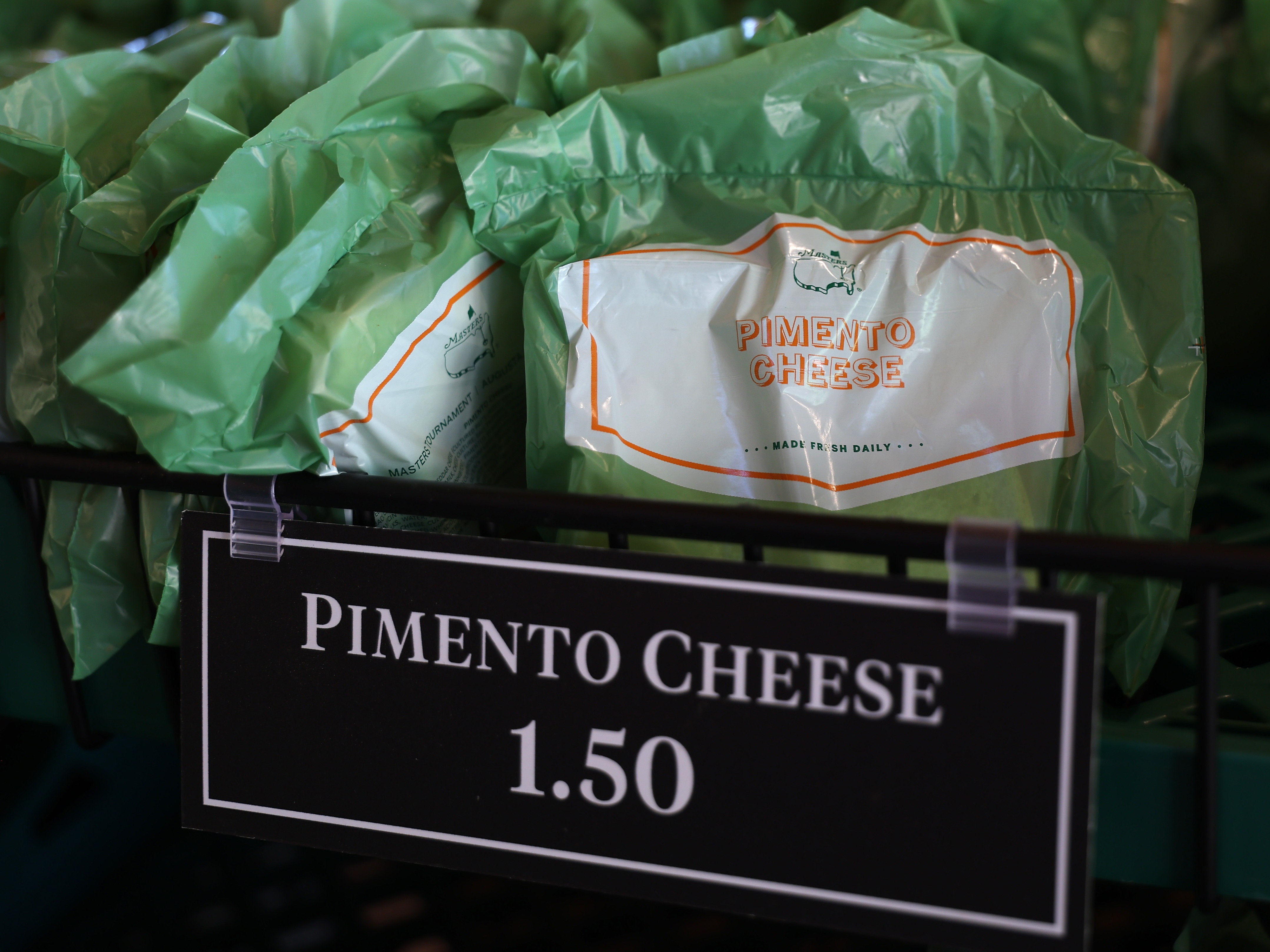 caption: Concession stand sandwiches range from $1.50 to $3 at the Masters this year.