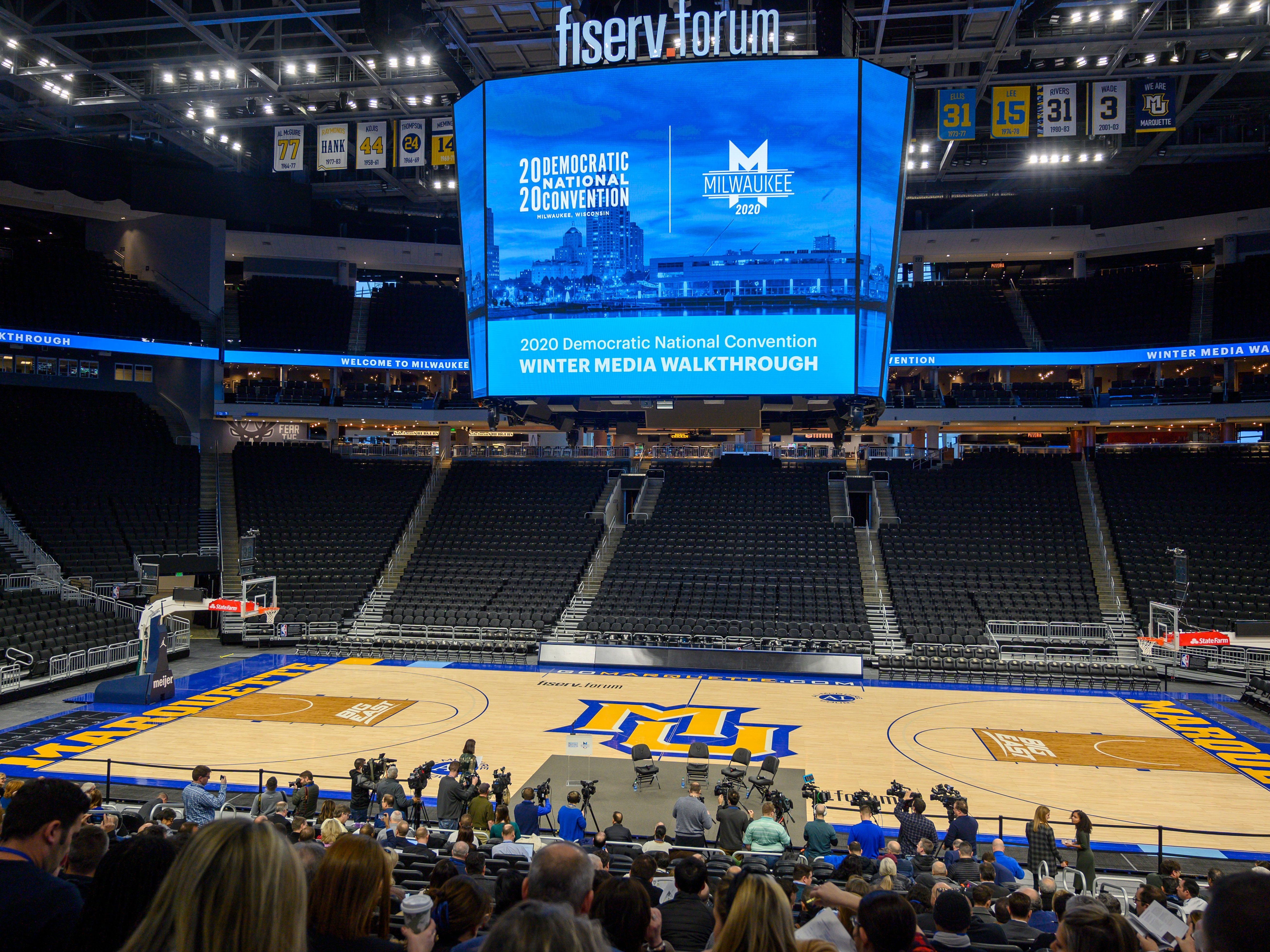 caption: The floor of the Fiserv Forum is seen during a January media walkthrough ahead of the Democratic National Convention in Milwaukee. The convention has been pushed back a month, to mid-August.