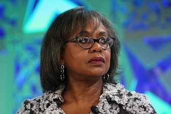 caption: Anita Hill speaks onstage at the Fortune Most Powerful Women Summit in October 2018 in Laguna Niguel, Calif.