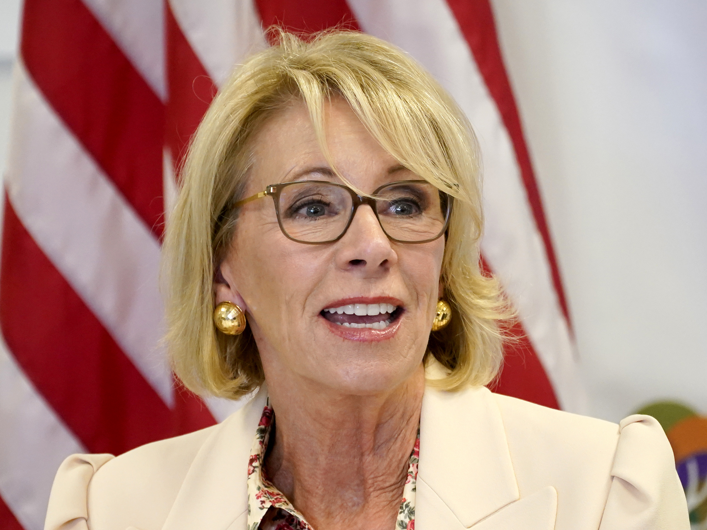 caption: U.S. Education Secretary Betsy DeVos announced her resignation on Thursday.