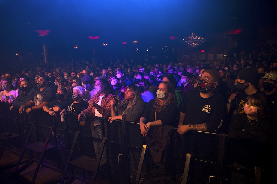 caption: A large crowd gathers to listen to Deep Sea Diver perform on Friday, November 12, 2021, at Showbox in Seattle. 