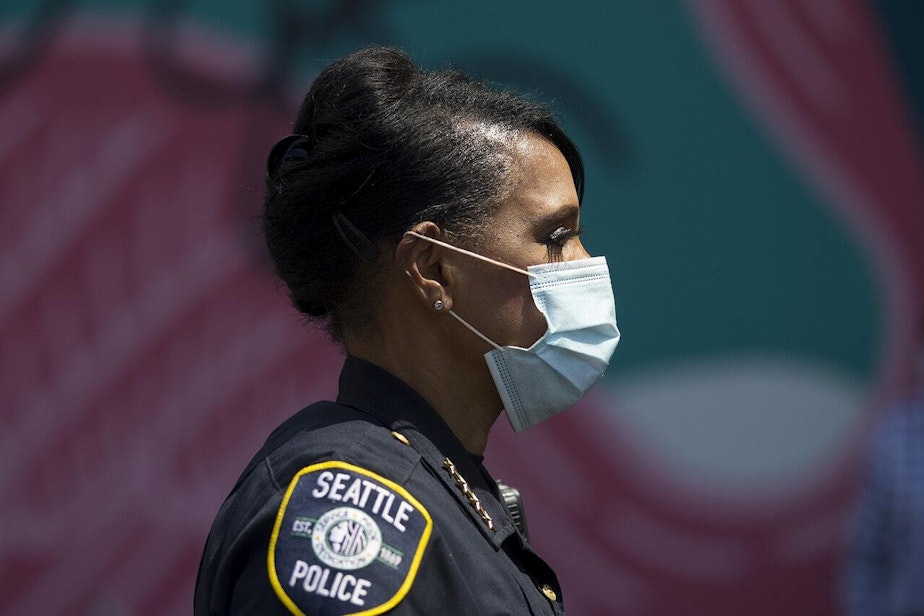 caption: Seattle Police Chief Carmen Best attends a vigil to recognize the senseless killing of African American men and women outside of the First African Methodist Episcopal Church on Monday, June 1, 2020, in Seattle